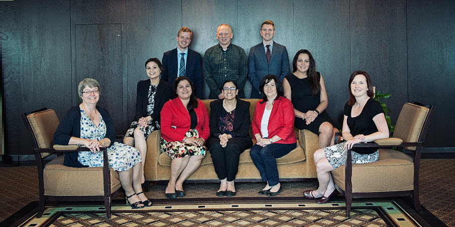 Back - left to right - Chris Poirier, Clint Savary, Ian Curry (Co-Chair).  Front - left to right - Lisa Matchim, Stella De Billy, Rana Mirdawi, Zadiha Iqbal, Rose Kottis, Margaret Tsetsakos (Co-Chair), Wanda Doiron (Absent: Anna Traer)