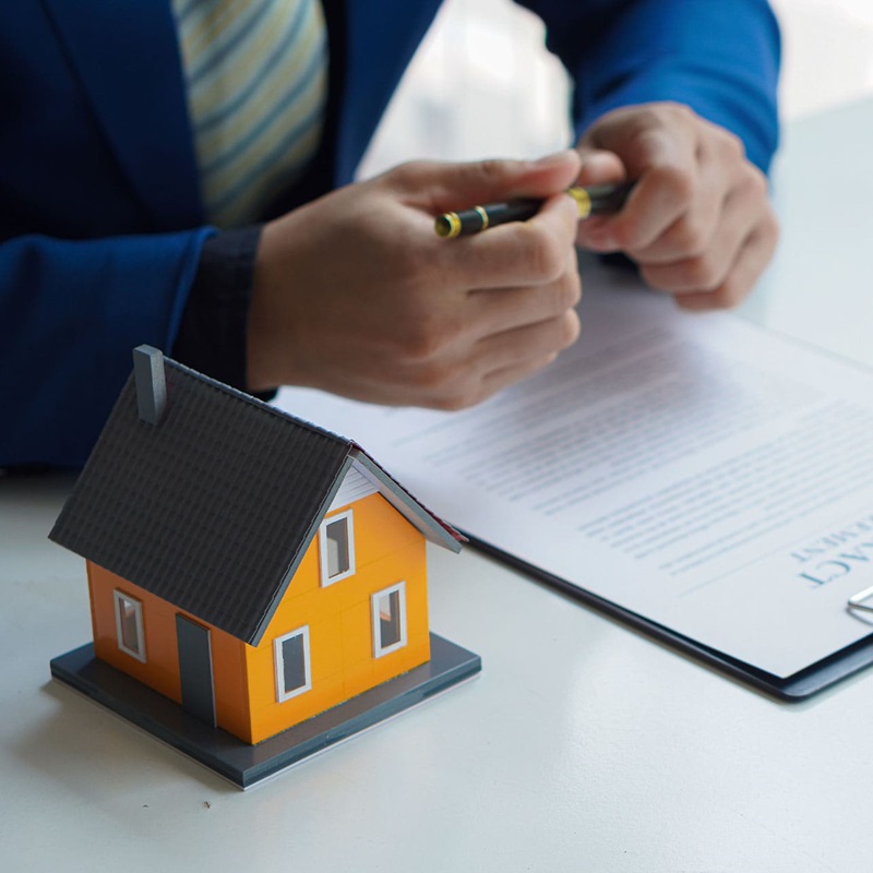 Real estate lawyer with documents