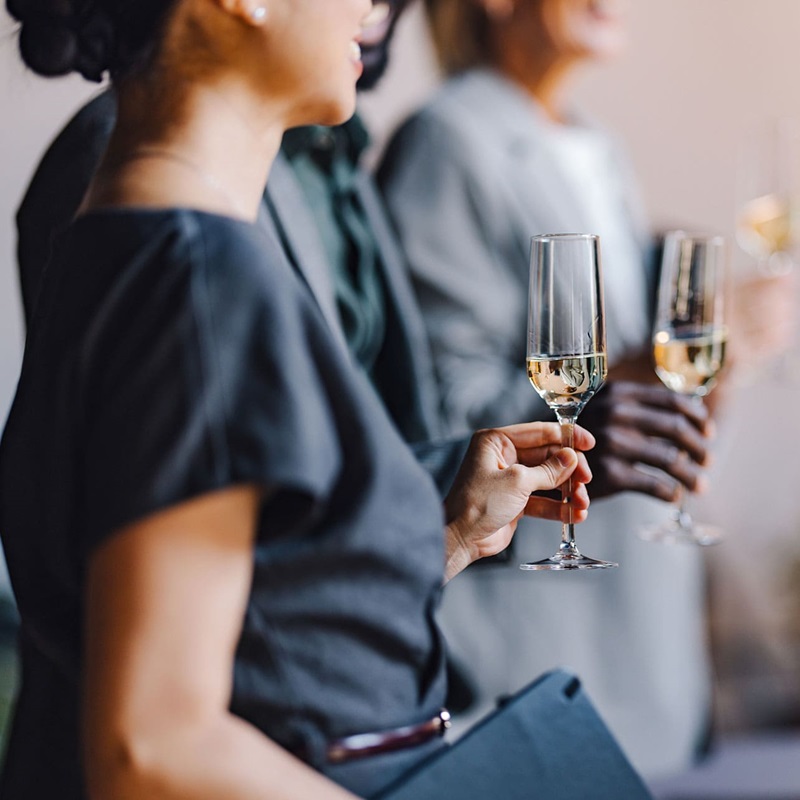 Lawyers and Law clerks holding glasses of champagne