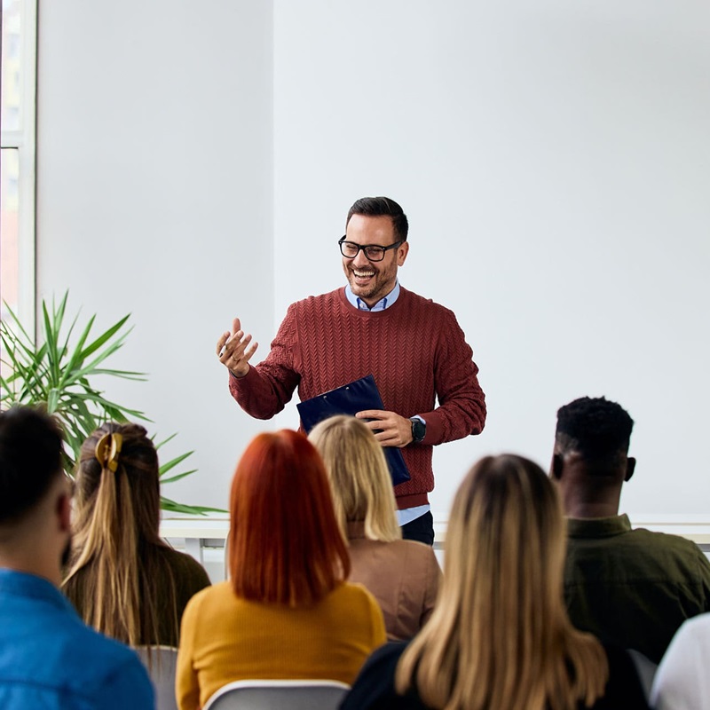 Man presenting to law clerks