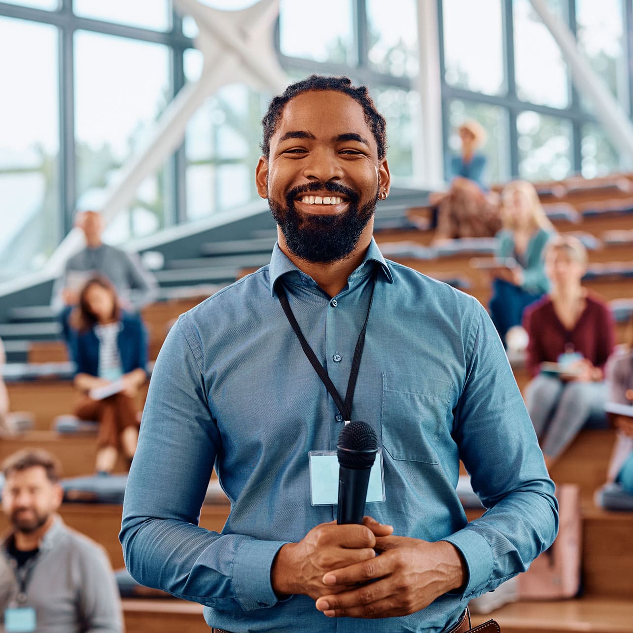 Law clerk smiling before speaking at a conference